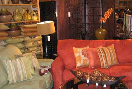 Showcase of couches in orange and green